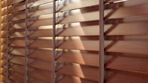 Wooden blinds with rich brown finish, offered by BM Furniture in Dubai