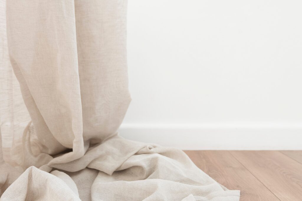 Light beige curtains with tie-back, affordable curtain solutions in Dubai